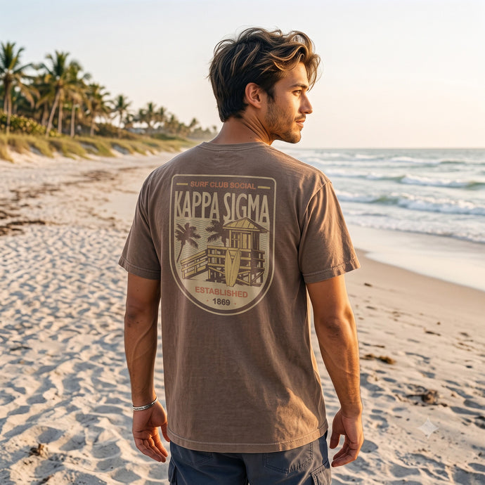 Brown Comfort Colors Surf Club Social T-shirt featuring a small front logo and a large surf club back graphic.