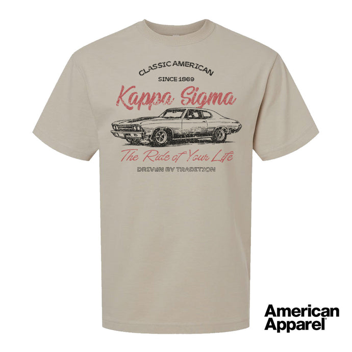 Beige T-shirt displayed on a plain background with a vintage-inspired graphic of a classic muscle car, mixed typography, and a soft red and black print design.