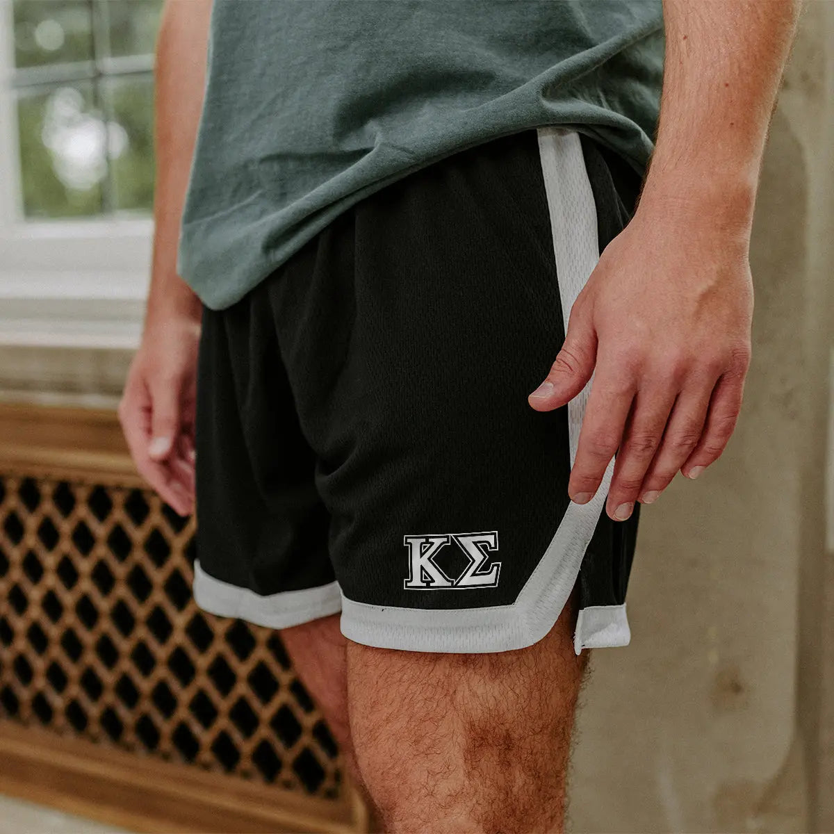 Kappa Sig Greek Fraternity Black 7" Mesh Shorts with Greek letters.